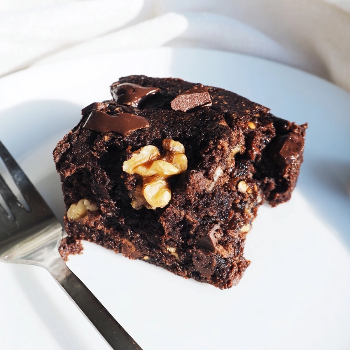 Golden-brown Zero-Waste Brownies, baked in an 8x8 pan, cooling and releasing decadent aromas.