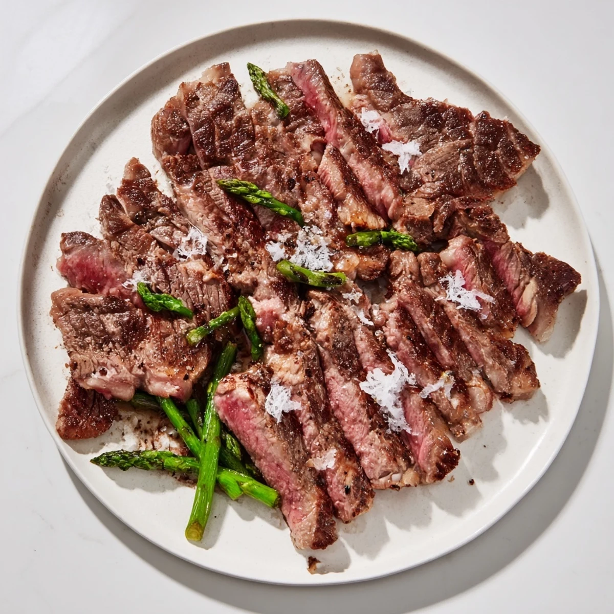 Close-up shot shows various fresh beef cuts, detailing their textures and best cooking methods.