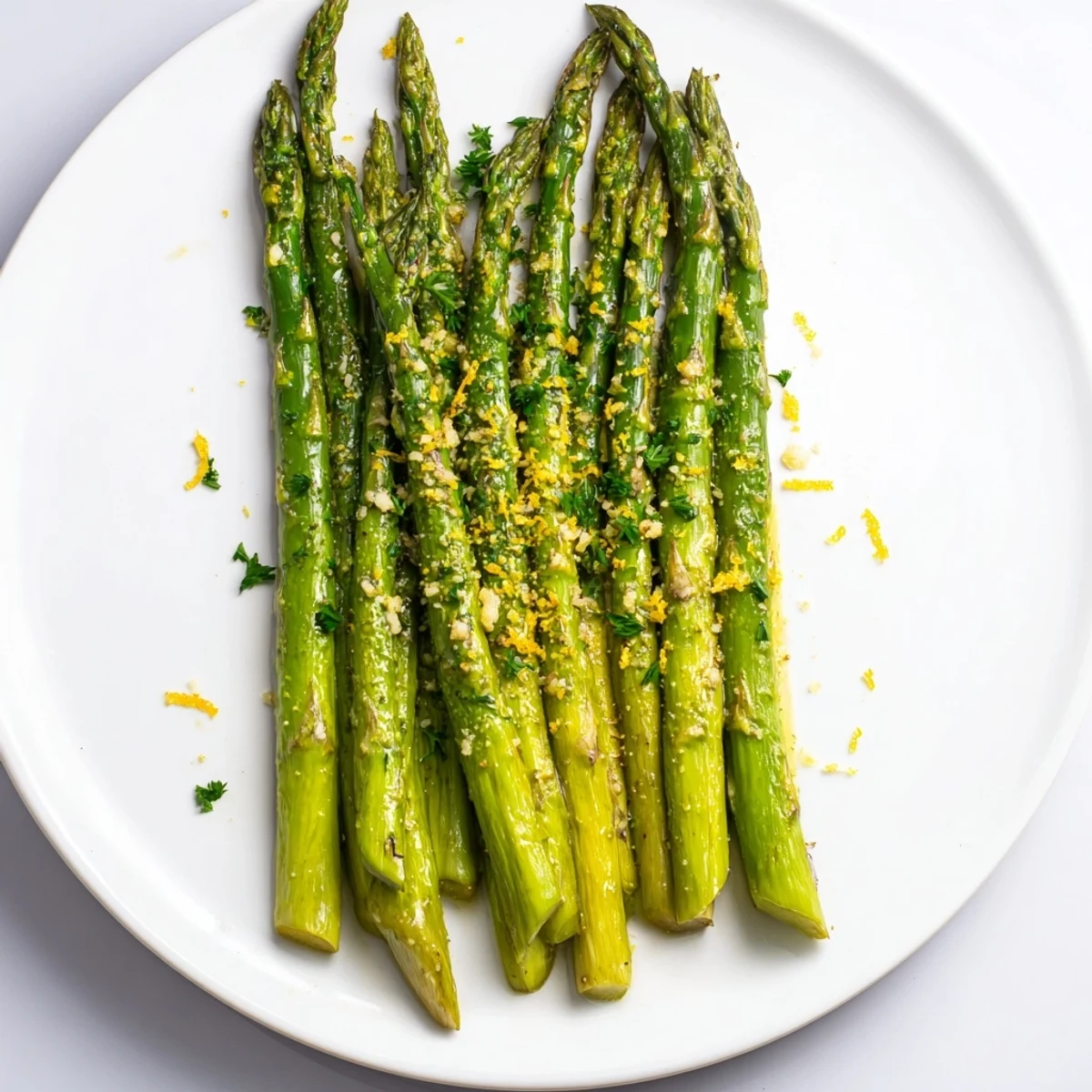 Warm, tender roasted asparagus spears with a hint of pepper, a delicious simple vegetable side.