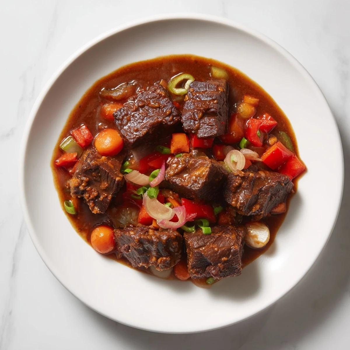 Savory meat spiced dish, prepared with warming spices that create an flavorful dinner centerpiece for sharing.