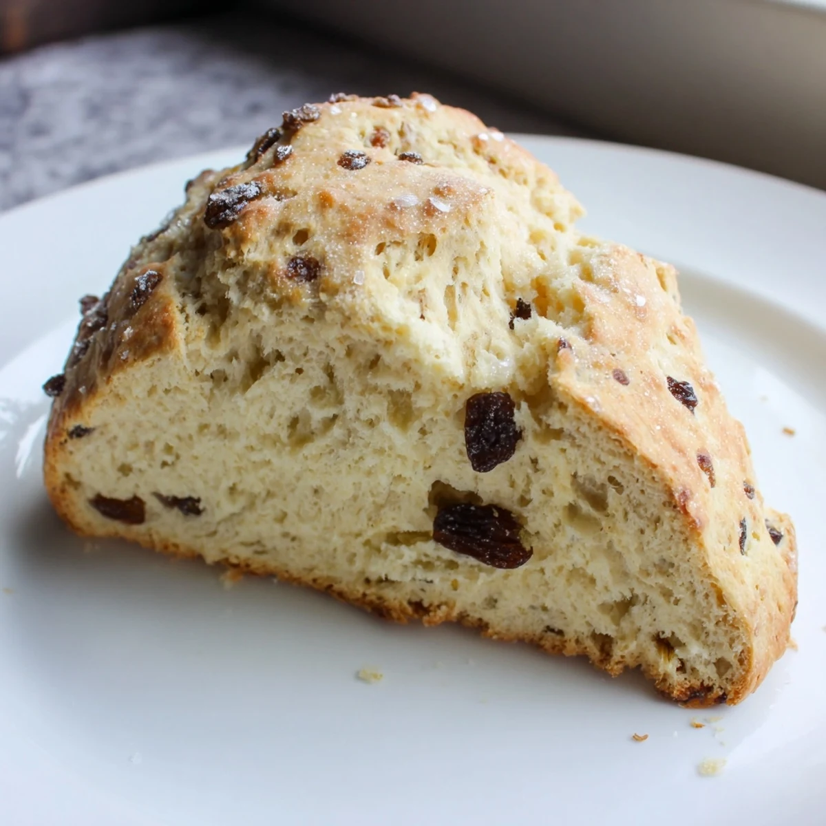 Irish Soda Bread Scones are served warm with Irish butter melting on their crumbly tops.