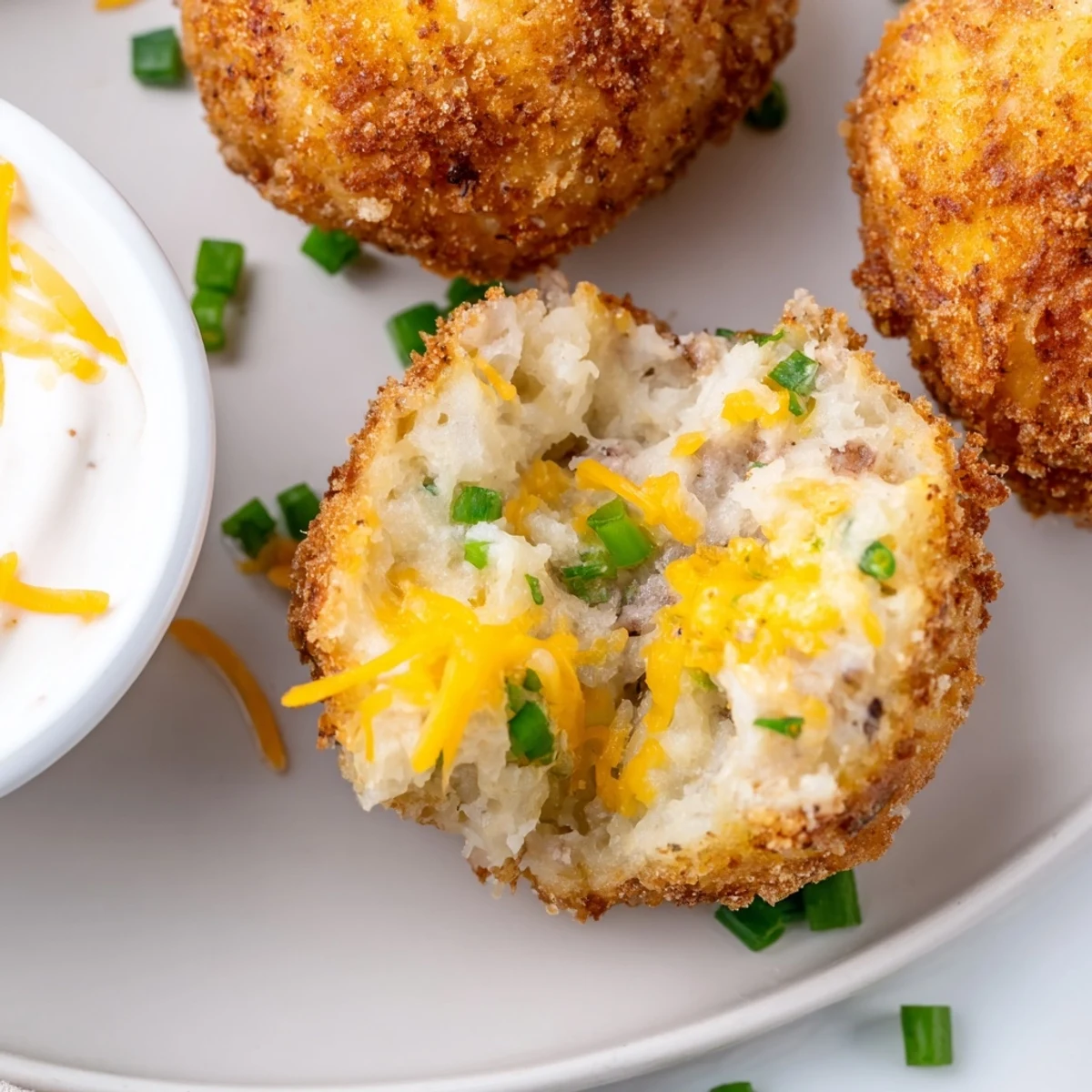 Crispy Fried Mashed Potato Balls served hot with ranch dip and scallions
