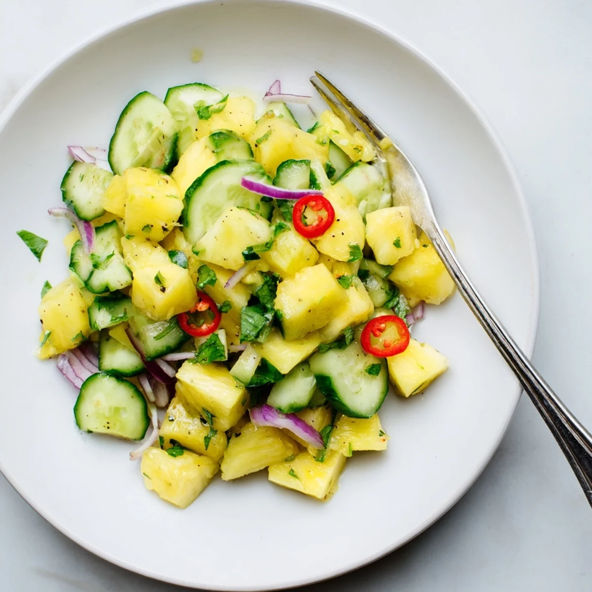 Pineapple Cucumber Salad served alongside grilled fish or tacos for summer meals